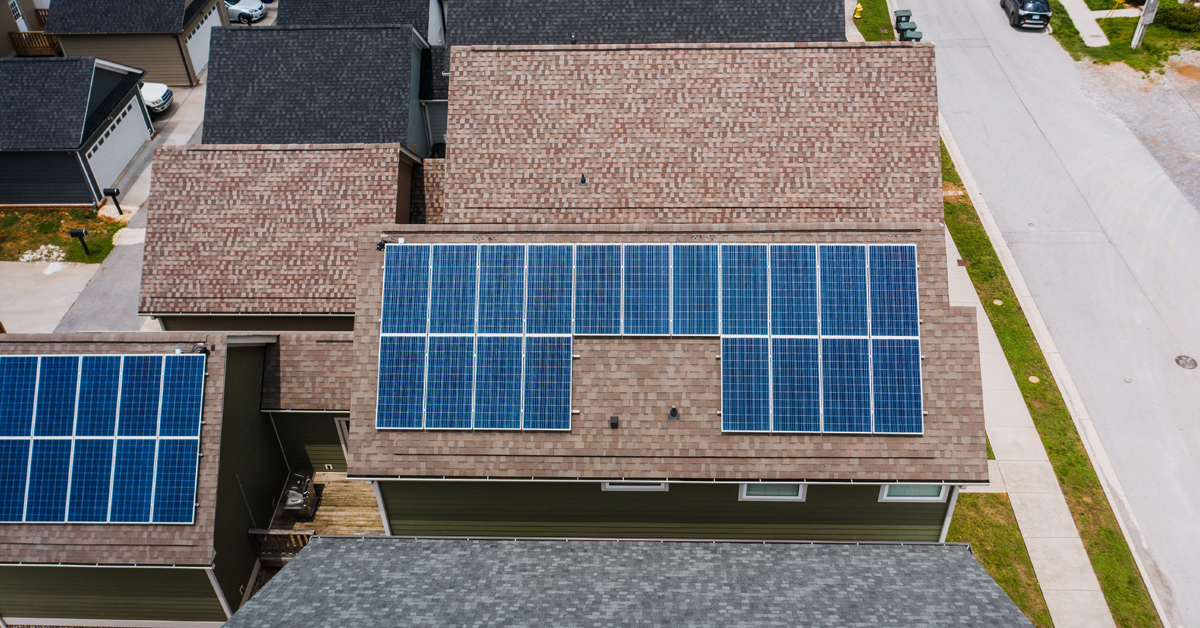 House rooftops with solar panels installed